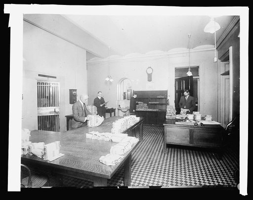 Treasury Dept. Ofc. of Comptroller of currency, Redemption Division: showing packages of old and mutilated bank notes received for destruction, [1914