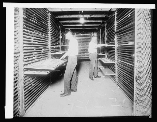 Bureau of Engraving & Ptg. Drying room showing old method of dying money: $4,500,000 aired daily, [1914