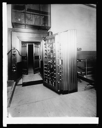 Bureau of Engraving & Printing. Twelve-ton steel door to vault containing distinctive paper on which U.S. and national bank notes and U.S. bonds are printed, [1914