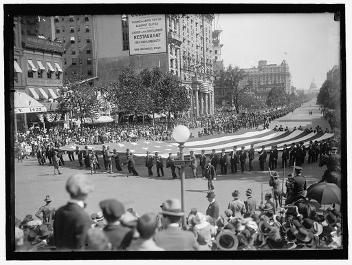 PARADE ON PENNSYLVANIA AVE. HUGE FLAG