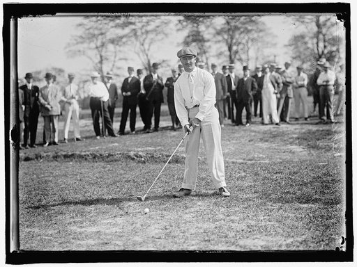 SHERMAN PLAYING GOLF