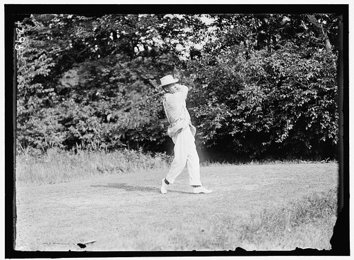 TRAVIS, WALTER. PLAYING GOLF