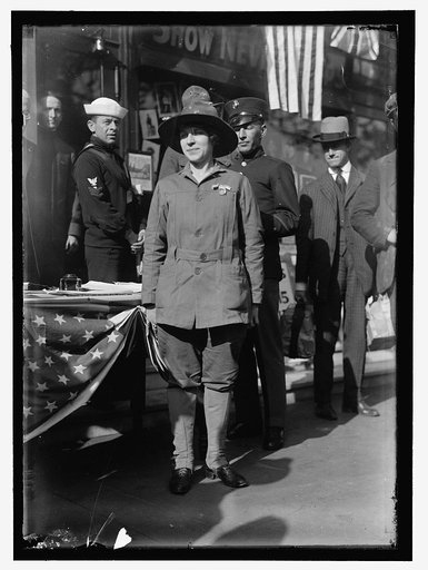 Dora Rodrigues, recruiter for service branches, possibly in front of the Cosmos Theater, Pennsylvania Avenue, Washington in May 1917