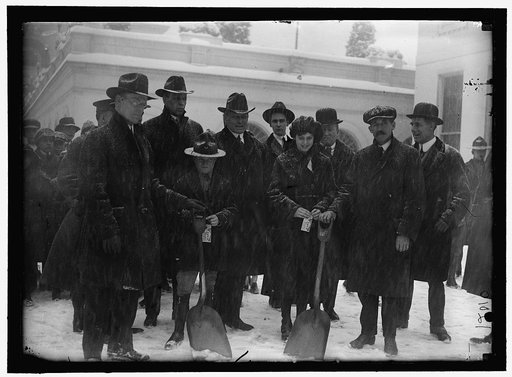 Group outside White House in snow