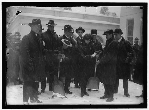 Group outside White House in snow