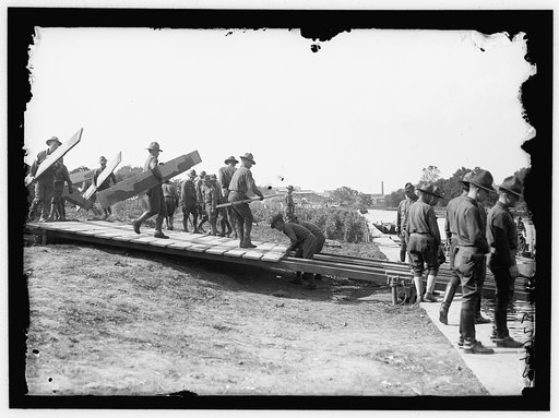 US Army Engineering unit building a pontoon bridge at Washington Barracks, Washington, D.C.