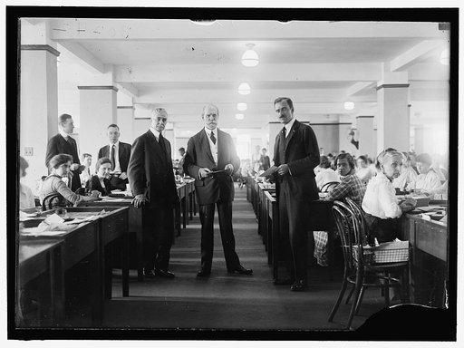Charles Evans Hughes, center