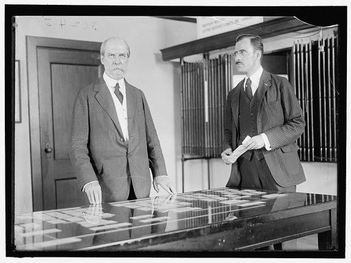 Charles Evans Hughes, left