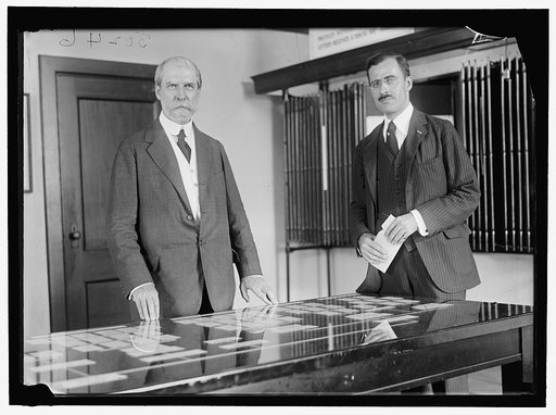 Charles Evans Hughes, left