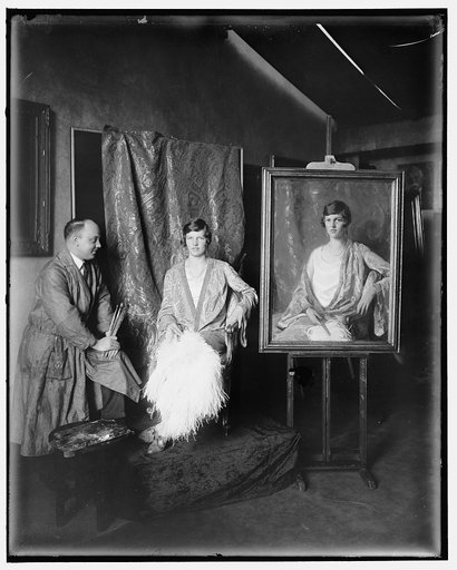 HARRIS & EWING. LADY WITH PORTRAIT