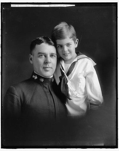 COXE, LEWIS LT. COMMANDER. WITH CHILD