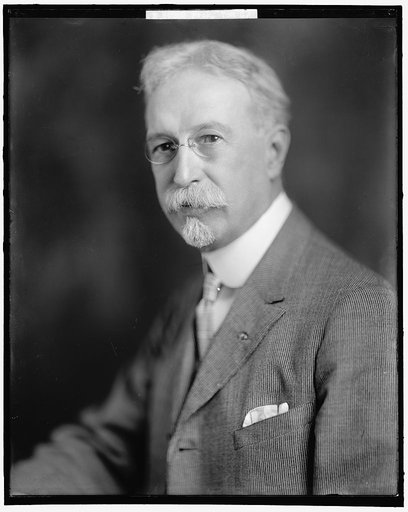 PECK, TOM C.