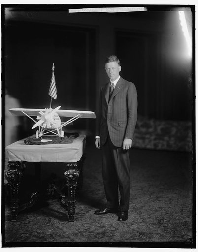 LINDBERGH, CHARLES, COLONEL. WITH PLANE MODEL