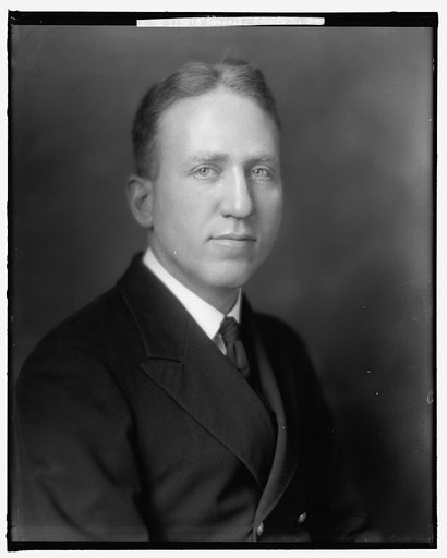 ROSSELL, H.E. COMDR.
