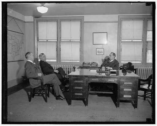 Left to right: Arthur C. Sullivan, John T. Walker, Jr., the Deputy Intermediate Comm.; Geo. M. Brennan, Intermediate Commissioner of F.C.A.
