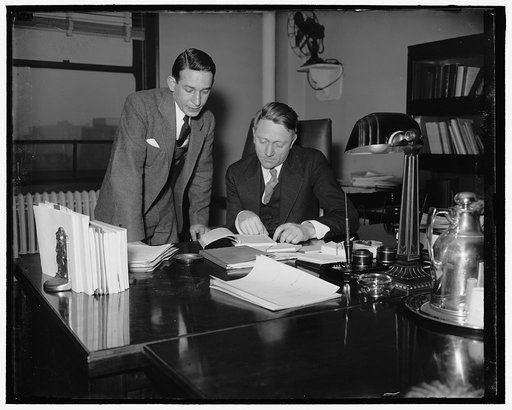 Wm. O. Douglass, Commissioner of S.E.C. and his Asst. Abe Fortos