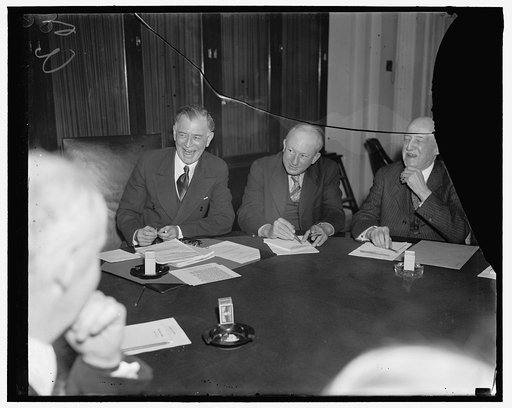 Pat Harrison, center