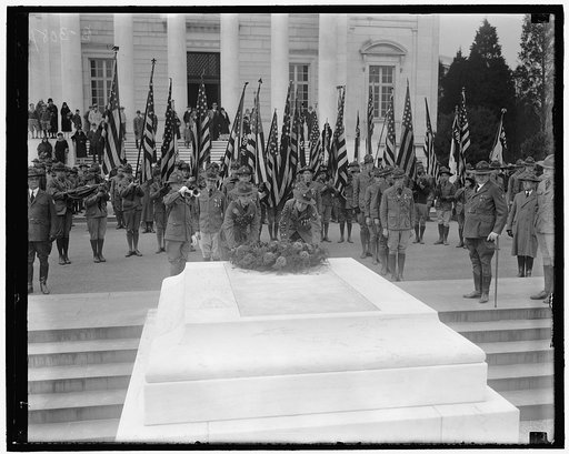 Boy Scouts honor America's Unknown Soldier in observing Armistice Day. Among the first to observe Armistice Day in Washington were the Boy Scouts of America, who journeyed to Arlington National Cemetery bright and early where they paid a colorful tribute to America's Unknown Soldier. Richard Buddeke
