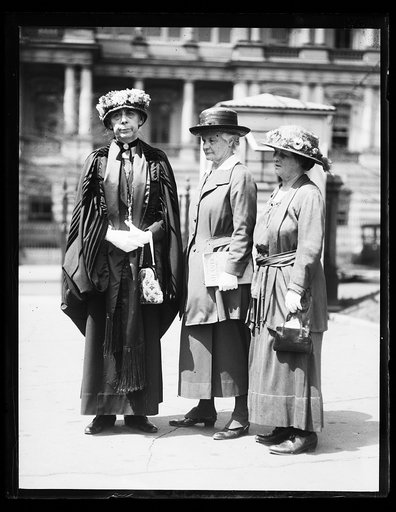 Women; State, War and Navy Building in background. Washington, D.C.