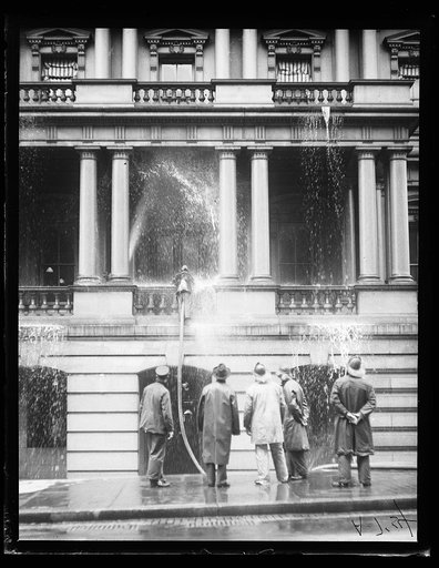 Extinguishing fire or washing building. State, War, and Navy building, Washington, D.C.