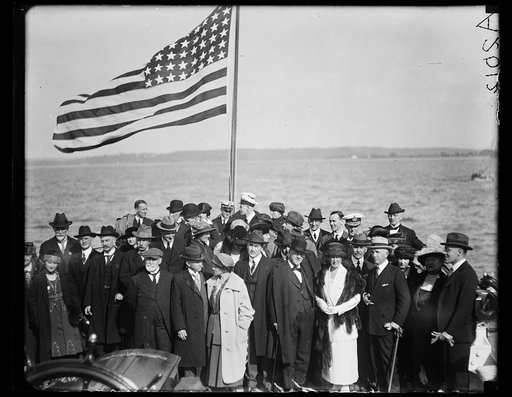 Group on deck of USS Sylph? Josephus Daniels, front; Sir Auckland Geddes, right