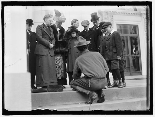 BOY SCOUTS. VISIT OF SIR ROBERT BADEN-POWELL TO D.C. MAKING FIRE; MRS. TAFT WATCHING