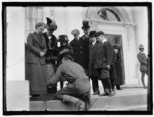 BOY SCOUTS. VISIT OF SIR ROBERT BADEN-POWELL TO D.C. MAKING FIRE; MRS. TAFT WATCHING