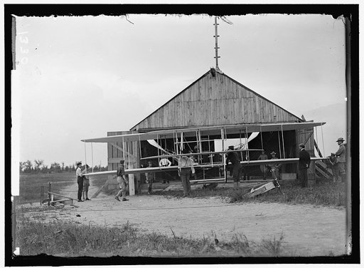 WRIGHT FLIGHTS, FORT MYER, VA, JULY 1909. FIRST ARMY FLIGHTS; HANGAR, ORVILLE WRIGHT, RIGHT