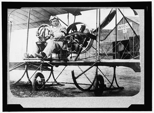 PECK, PAUL. COMMERCIAL AVIATOR. IN GYRO TYPE PLANE SPONSORED BY BERLINER AT MINEOLA, N.Y.