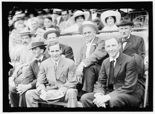 BASEBALL, PROFESSIONAL. CHAMP CLARK, WITH SON BENNETT, LEFT CENTER