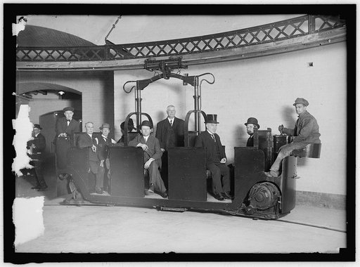 O'GORMAN, JAMES ALOYSIUS. SENATOR FROM NEW YORK, 1911-1917. 3RD FROM RIGHT, RIDING MONORAIL CAR