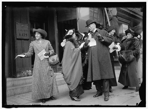 WOMAN SUFFRAGE. ADVERTISING PARADE