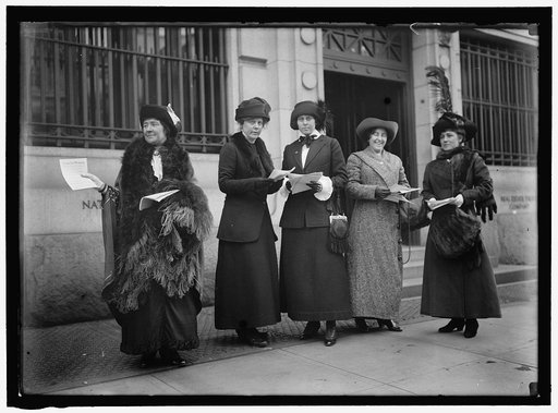 WOMAN SUFFRAGE. ADVERTISING PARADE