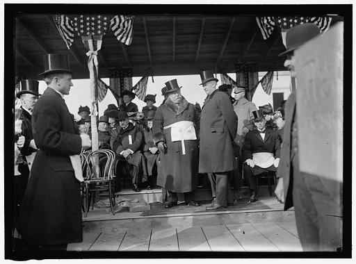 ALL SOULS CHURCH. CEREMONIES AT LAYING OF A CORNERSTONE AT 16TH AND R. CHURCH NOT BUILT THERE, LATER BUILT AT 16TH AND HARVARD ST. SEATED AT RIGHT OF POLE: GEN. WOODHULL; MYRON M. PARKER, PAST GRAND MASTER; BERNARD R. GREEN. STANDING: PRESIDENT TAFT AND THE PRESIDENT OF AMERICAN UNITARIAN ASSOCIATIO