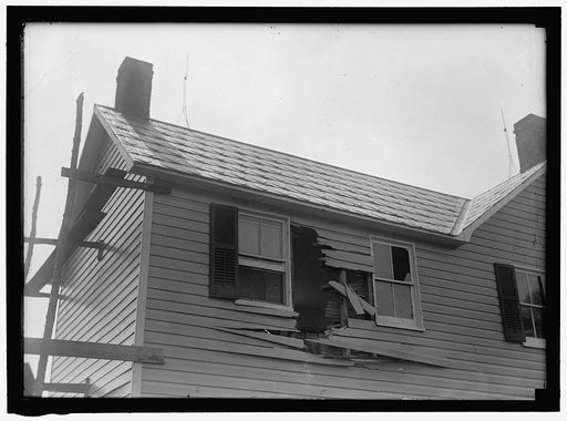 INDIAN HEAD, MD. NAVY PROVING GROUND. RESIDENCE OF GEORGE SWANN, DAMAGED BY 16' SHELL THAT HIT ANOTHER IN SANDBANK, AND WAS DEFLECTED OVER COUNTRYAT 3/4 ANGLE