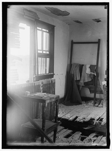 INDIAN HEAD, MD. NAVY PROVING GROUND. RESIDENCE OF GEORGE SWANN, DAMAGED BY 16' SHELL THAT HIT ANOTHER IN SANDBANK, AND WAS DEFLECTED OVER COUNTRYAT 3/4 ANGLE
