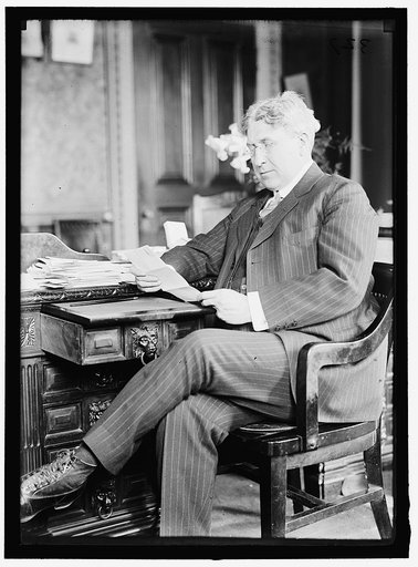 GARRISON, LINDLEY M. SECRETARY OF WAR, 1913-1916. AT DESK