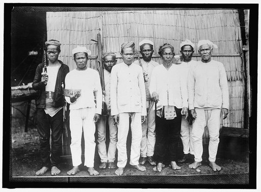 PHILIPPINES. MORO DATU AND HIS FOLLOWERS