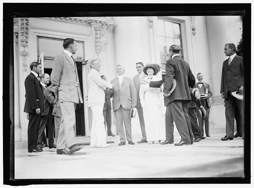 BOY SCOUTS. RELAY RACE STARTING AT WHITE HOUSE. DISTRICT HEAD OF SCOUTS, COLINI LIVINGSTONE, SHAKING HANDS WITH PRESIDENT WILSON