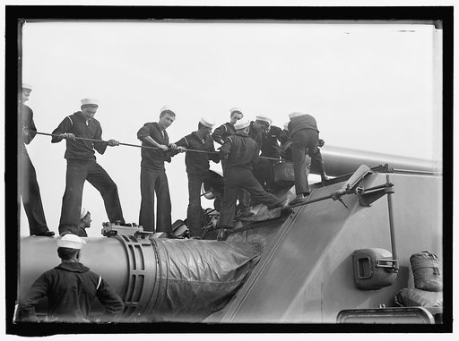 TARGET PRACTICE. CLEANING 12' GUN
