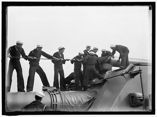 TARGET PRACTICE. CLEANING 12' GUN