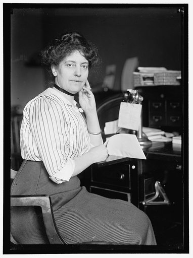 SHELDON, MISS CAROLYN B. AT DESK
