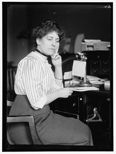 SHELDON, MISS CAROLYN B. AT DESK