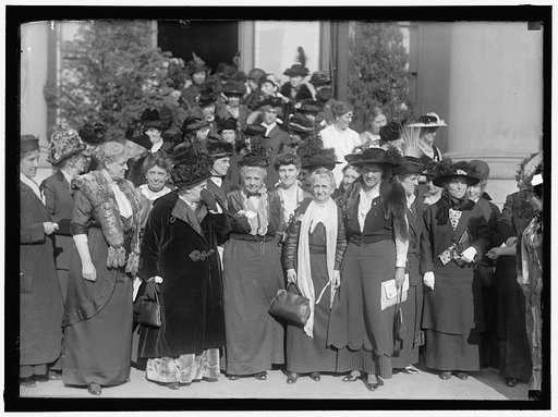 CONSTRUCTIVE PEACE GROUP: AT EXTREME LEFT, CHARLOTTE P. GILLMAN; NEXT MRS. C.C. CATT; DR. A.H. SHAW; MRS. HENRY WILLARD; MRS. ANNA G. SPENCER; MARION T. BURRITT; JANET RICHARDS. 2ND ROW, 2ND FROM LEFT, MRS. JULIUS KAHN; RIGHT, ROSALIE JONES; RIGHT, HALF WAY BACK, MRS. RICHARD BOECKEL
