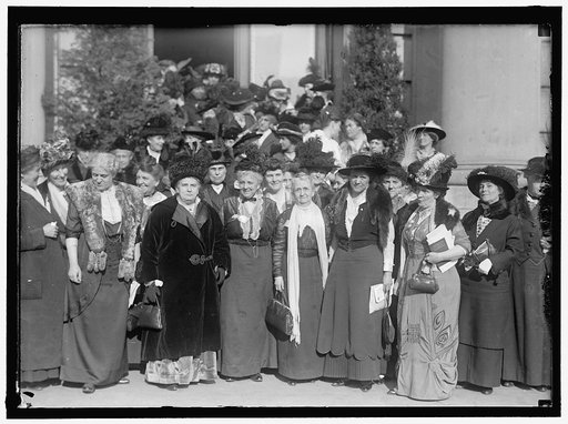 CONSTRUCTIVE PEACE GROUP: AT EXTREME LEFT, CHARLOTTE P. GILLMAN; NEXT MRS. C.C. CATT; DR. A.H. SHAW; MRS. HENRY WILLARD; MRS. ANNA G. SPENCER; MARION T. BURRITT; JANET RICHARDS. 2ND ROW, 2ND FROM LEFT, MRS. JULIUS KAHN; RIGHT, ROSALIE JONES; RIGHT, HALF WAY BACK, MRS. RICHARD BOECKEL