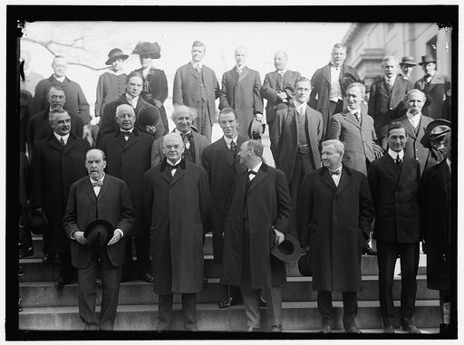 CALIFORNIANS AT WHITE HOUSE: FRONT ROW: SEC. HOUSTON, LEFT IN 4908 ONLY; SEN. PERKINS; SEN. WORK; SEC. DANIELS; SEC. WILSON; SEC. McADOO; SEC. BRYAN. 2ND ROW: REPS. BAKER; STEPHENS; KAHN; CURRY; ASST SEC. OF NAVY F.D. ROOSEVELT; REP. KENT; COMMR. CAMINETTI. 3RD ROW: REPS. HAYES; KNOWLAND. TOP ROW: R
