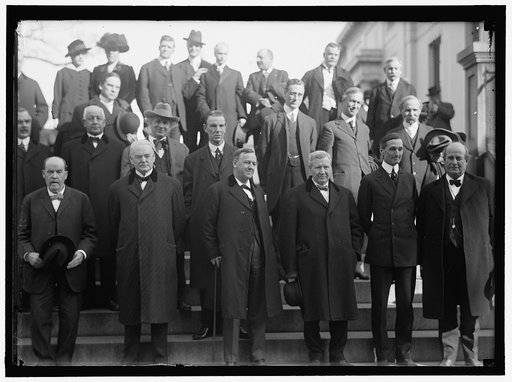 CALIFORNIANS AT WHITE HOUSE: FRONT ROW: SEC. HOUSTON, LEFT IN 4908 ONLY; SEN. PERKINS; SEN. WORK; SEC. DANIELS; SEC. WILSON; SEC. McADOO; SEC. BRYAN. 2ND ROW: REPS. BAKER; STEPHENS; KAHN; CURRY; ASST SEC. OF NAVY F.D. ROOSEVELT; REP. KENT; COMMR. CAMINETTI. 3RD ROW: REPS. HAYES; KNOWLAND. TOP ROW: R