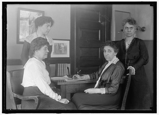 LATHROP, JULIA. HEAD OF CHILDREN'S BUREAU, LABOR DEPT. WITH ASSISTANCE IN CHILDREN'S BUREAU
