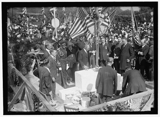 MEMORIAL AMPHITHEATRE, ARLINGTON. CORNERSTONE LAYING. AROUND STONE ARE: 2 UNIDENTIFIED; FREDERICK OWEN, CUSTODIAN OF FLAGS; COL. HARTS; G.A.R. VETERAN; PRESIDENT WILSON; SEC. DANIELS; 2 UNIDENTIFIED; SEN. GEORGE SUTHERLAND; ELLIOT WOODS; UNIDENTIFIED