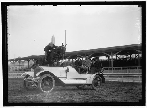 HORSE SHOWS. RALPH COFFIN JUMPING HIS HORSE OVER SYLVANUS STOKE'S ROLLS ROYCE
